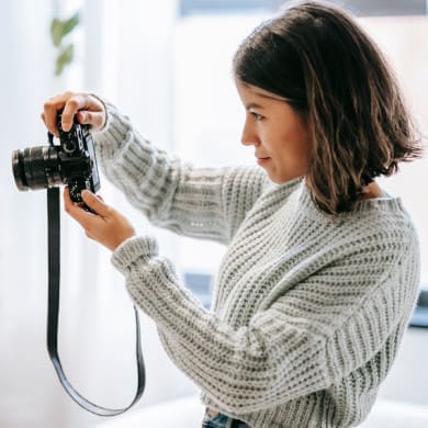 Realtor Taking Pictures of Home Prior to Creating the Home Listing